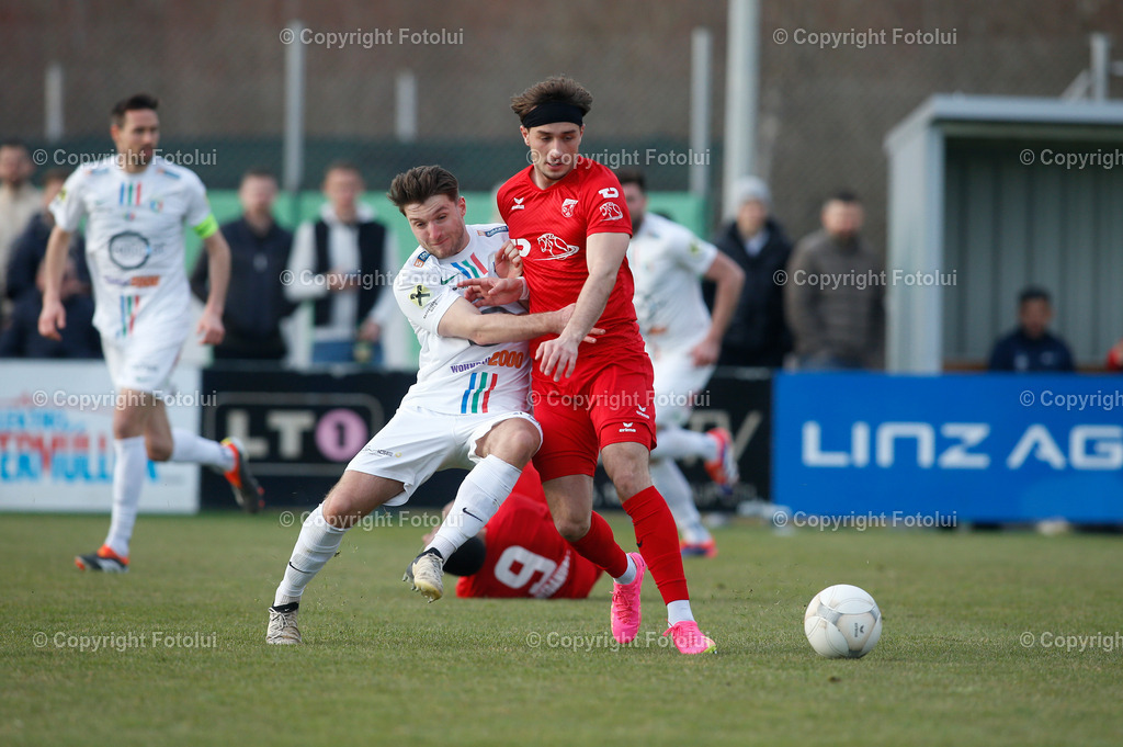 A_LUI_22032025_23 | SPORT,FUSSBALL,REGIONALLIGA MITTE ASKOE OEDT-HERTHA WELS 22.03.2025 IM BILD: BEN TRAVIS WOERNDL (OEDT) UND HANNES HUBER (WELS) FOTO:FOTOLUI