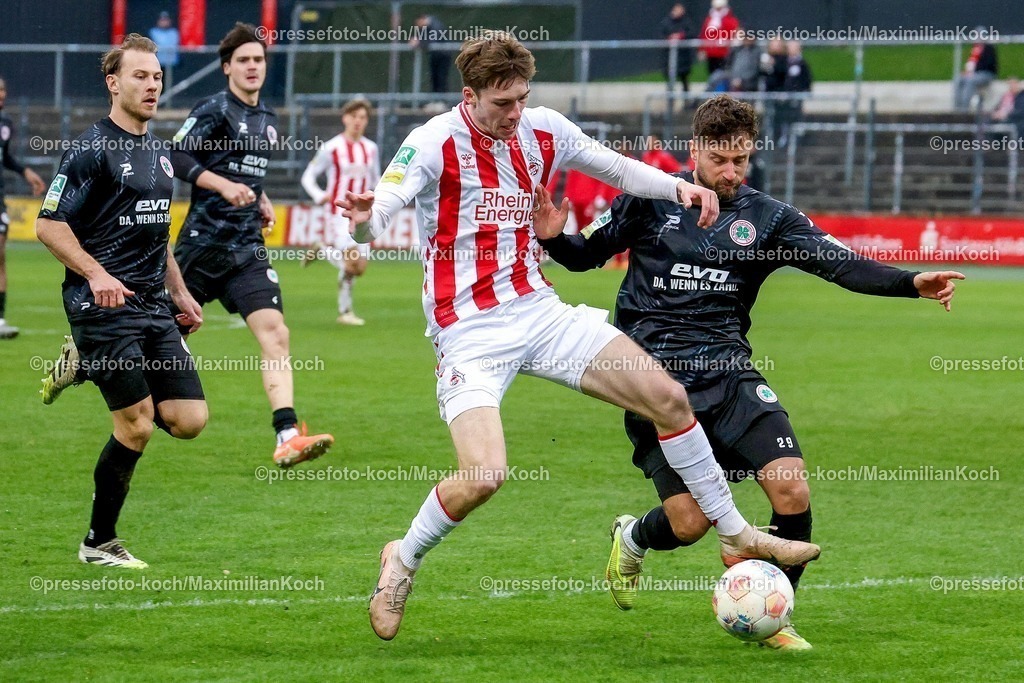 xSSCx14032601041 | 15.03.2026, xsscx, Herren Fussball, 1. FC Köln U21 - Rot-Weiß Oberhausen, Regionalliga West, 26. Spieltag, Franz-Kremer Stadion, Saison 2025 2026: Bernie Lennemann (1. FC Köln #7) im Zweikampf gegen Michel Niemeyer (Rot-Weiß Oberhausen #29) DFB regulations prohibit any use of photographs as image sequences and or quasi-video. Photo: xSandraxScherningxPressefotoKochx