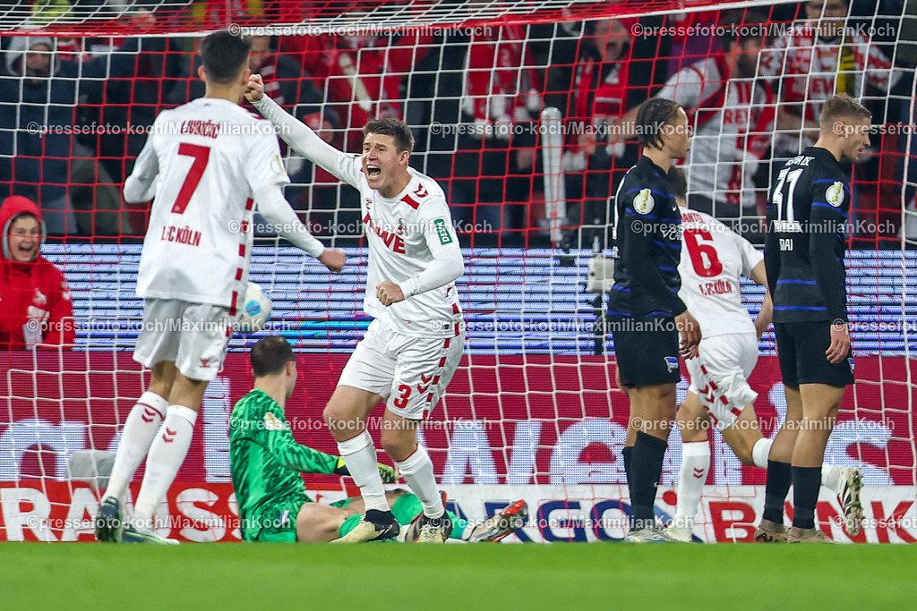 1FC04122401040 | 04.12.2024, Fußball, 1. FC Köln - Hertha BSC, Achtelfinale DFB-Pokal, RheinEnergieSTADION, Saison 2024 2025: Torjubel nach dem 1:1 durch Dominique Heintz (1.FC Köln #3)DFB regulations prohibit any use of photographs as image sequences and or quasi-video.
