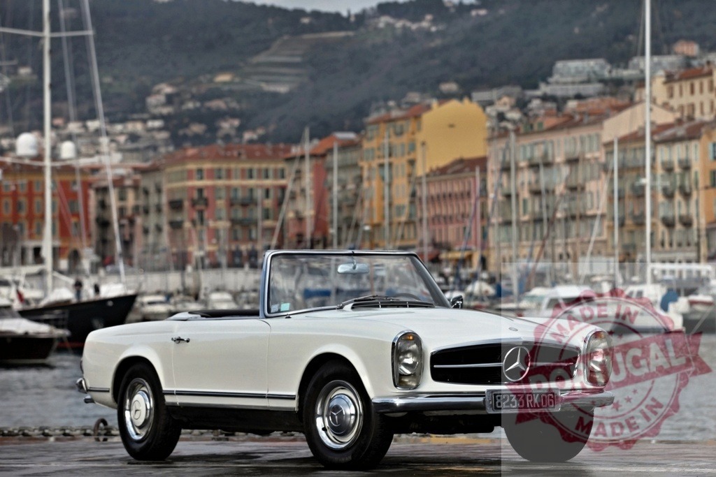 White Mercedes-Benz 280 SL Pagoda parked in Villefranche-sur-Mer | Classic white Mercedes-Benz 280 SL parked on the pier, overlooking the colorful buildings of Villefranche-sur-Mer and its marina - Realisiert mit Pictrs.com