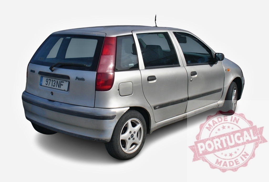 Silver Fiat Punto showing back view, parked and isolated on white | Generic silver Fiat Punto with visible back, parked and isolated on white background - Realized with Pictrs.com