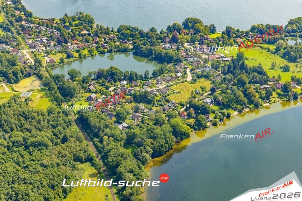 Klassische Luftaufnahme ohne Drohne zeigt:Timmdorf Trentsee bei Malente - Die Luftbildaufnahme wurde 2025 vom UL-Flugzeug heraus erstellt ( keine Drohnenaufnahme ) - Hochauflösende Luftaufnahme -Nicht vergleichbar mit Google Maps oder Satelittenbilder- Die Geschenkidee !Mit Lizenz und Bildrechte bestellbar