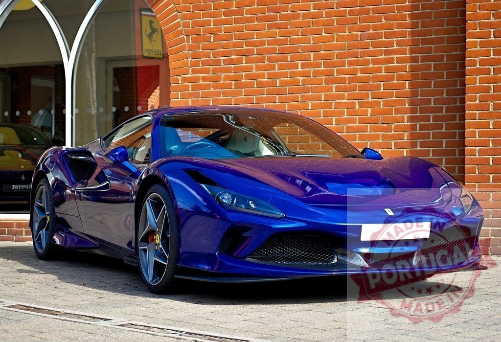 Ferrari F8 Tributo blue supercar parked at dealership | Ferrari F8 Tributo supercar parked outside a dealership, showcasing luxury and performance - Realized with Pictrs.com