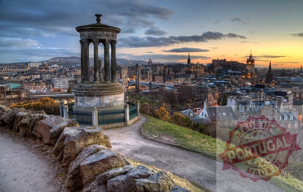 Dugald Stewart Monument with Edinburgh cityscape at sunset | Dugald Stewart Monument overseeing Edinburgh city view from Calton Hill at sunset - Realized with Pictrs.com