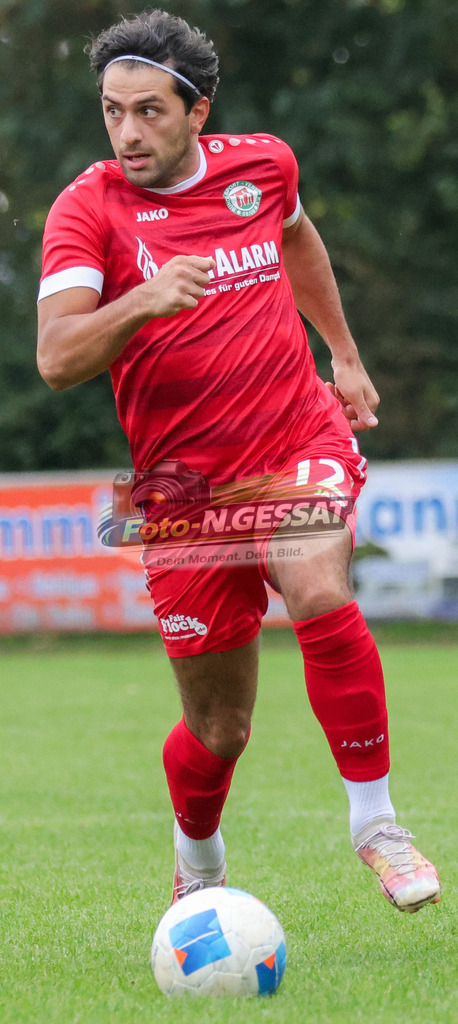 Bünder SV - VfL Holsen | Auf dem Bild zu sehen: rot Bünder SV: Batuhan Kaymak Bünder SV, VfL Holsen, Saison 26/27, Kreisliga A, Bünde, Deutschland - Realisiert mit Pictrs.com