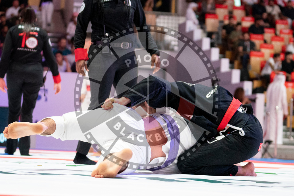 20231109PBB5312 | Fighters compete during the AJP World Professional Championship in the Mubadala Arena in Abu Dhabi, Arab United Emirates, on November 9, 2023.