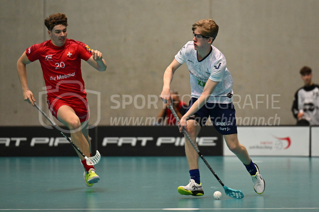 Switzerland B U19 vs Finland U19 - 2. February 2024 | Switzerland B U19 vs Finland U19
U19 Men International Matches in Switzerland
GoEasy Arena, Siggenthal Station
Switzerland forward #20 Jamie Martinjas and Finland defender #8 Martin Carlsson.
Credit: Markus Aeschimann | <a href="https://www.markus-aeschimann.ch">Sportfotografie Markus Aeschimann</a> | <a href="https://www.instagram.com/sportfotografie.aeschimann">@sportfotografie.aeschimann</a> - Realisiert mit Pictrs.com