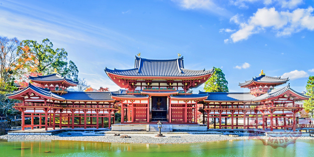 Byodo-in Temple in Uji Kyoto Japan during autumn | Byodo-in Phoenix Hall reflecting in a tranquil pond on a sunny autumn day - Realisiert mit Pictrs.com