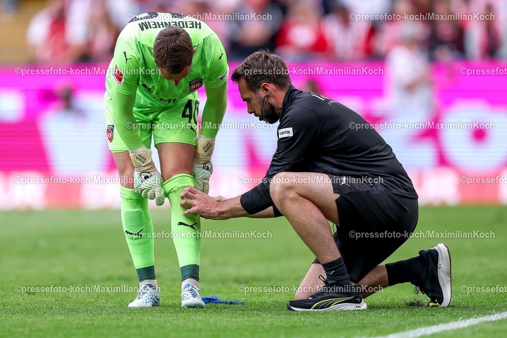 1FC10052601062 | 10.05.2026, Fußball, 1. FC Köln - 1. FC Heidenheim, 1. Fußball Bundesliga Herren, 33. Spieltag, RheinEnergie-STADION, Saison 2025 / 2026: Frank Feller&nbsp; (FC Heidenheim #40) muss medizinisch versorgt werden  DFB regulations prohibit any use of photographs as image sequences and or quasi-video.