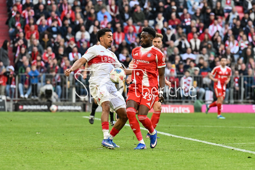 FC Bayern München - VfB Stuttgart | MUNICH, GERMANY - 19. APRIL: tackle between Tiago TOMAS (VfB Stuttgart 8) and Alphonso DAVIES (FC Bayern Munich 19) during the Bundesliga Match between FC Bayern Munich vs. VfB Stuttgart at Matchday 30 at Allianz Arena / DFL REGULATIONS PROHIBIT ANY USE OF PHOTOGRAPHS AS IMAGE SEQUENCES AND/OR QUASI-VIDEO