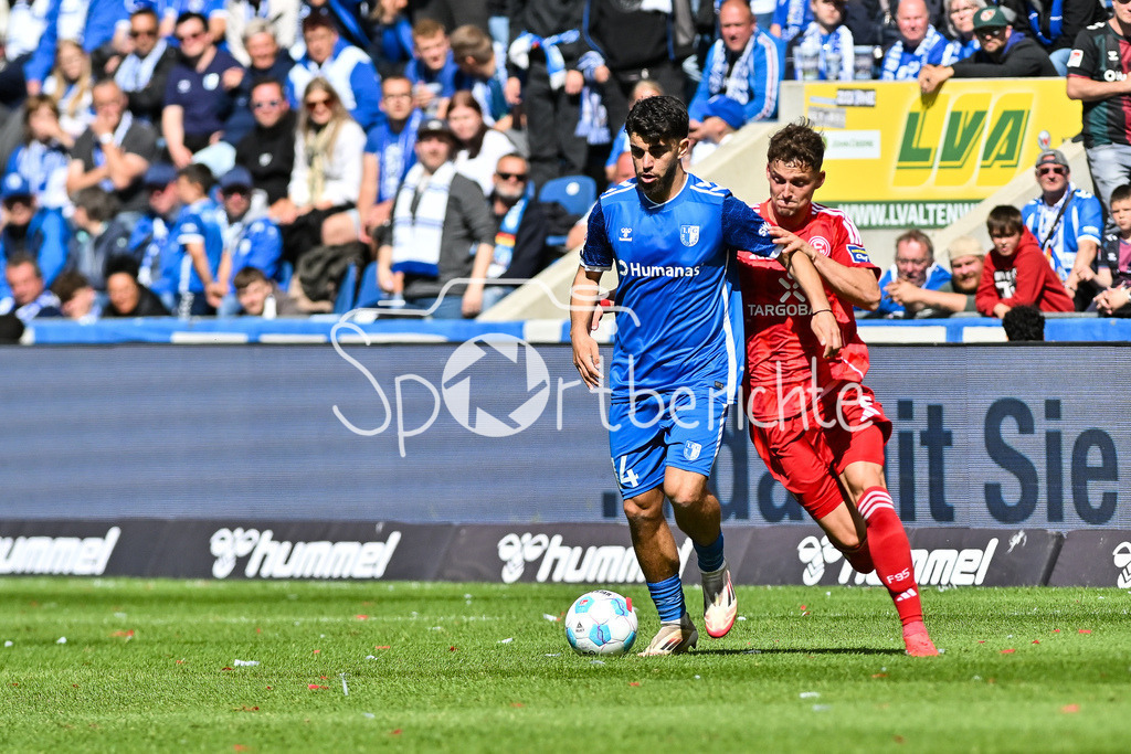 1. FC Magdeburg - Fortuna Düsseldorf | im Duell Abu-Bekir EL-ZEIN (FC Magdeburg 14) und Moritz HEYER (Fortuna Duesseldorf 5) / Zweikampf / 2. Bundesliga: 1. FC Magdeburg - Fortuna Duesseldorf, Avnet-Arena am 18.05.2025 / DFL REGULATIONS PROHIBIT ANY USE OF PHOTOGRAPHS AS IMAGE SEQUENCES AND/OR QUASI-VIDEO