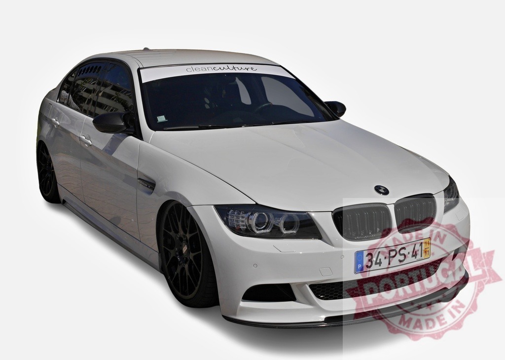 Tuned white BMW e90 featuring aftermarket parts is parked and showing tuning modifications | White BMW e90 featuring tuning modifications like black rims, aftermarket front bumper and modified headlights is parked - Realized with Pictrs.com