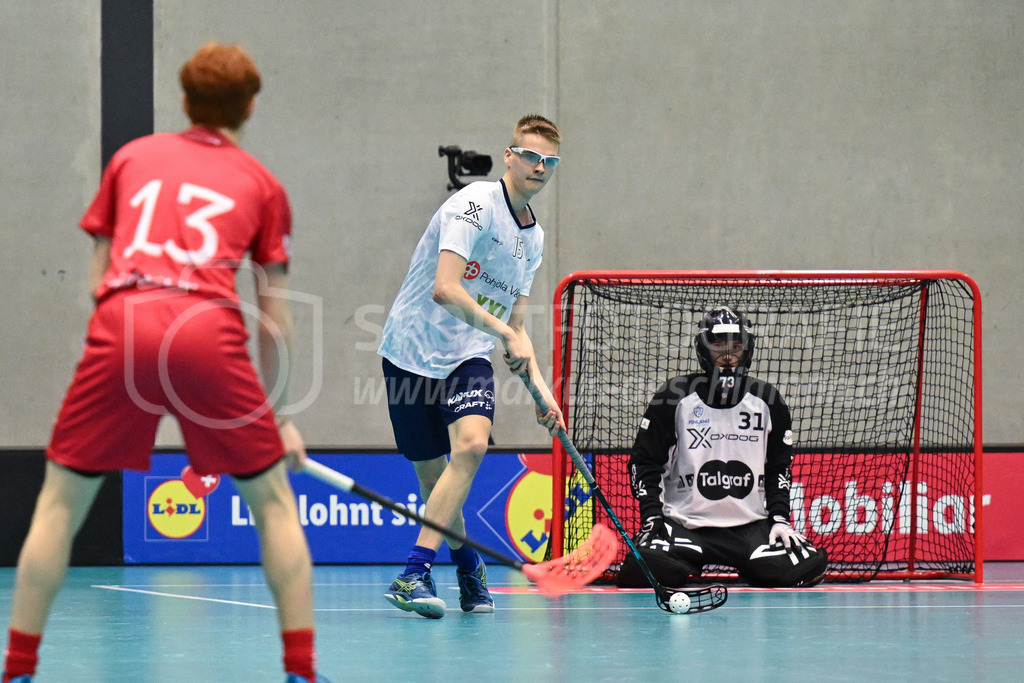 Switzerland B U19 vs Finland U19 - 2. February 2024 | Switzerland B U19 vs Finland U19
U19 Men International Matches in Switzerland
GoEasy Arena, Siggenthal Station
Finland defender #15 Roope Herpola and Finland goalkeeper #31 Veikko Rauhanen.
Credit: Markus Aeschimann | <a href="https://www.markus-aeschimann.ch">Sportfotografie Markus Aeschimann</a> | <a href="https://www.instagram.com/sportfotografie.aeschimann">@sportfotografie.aeschimann</a> - Realisiert mit Pictrs.com