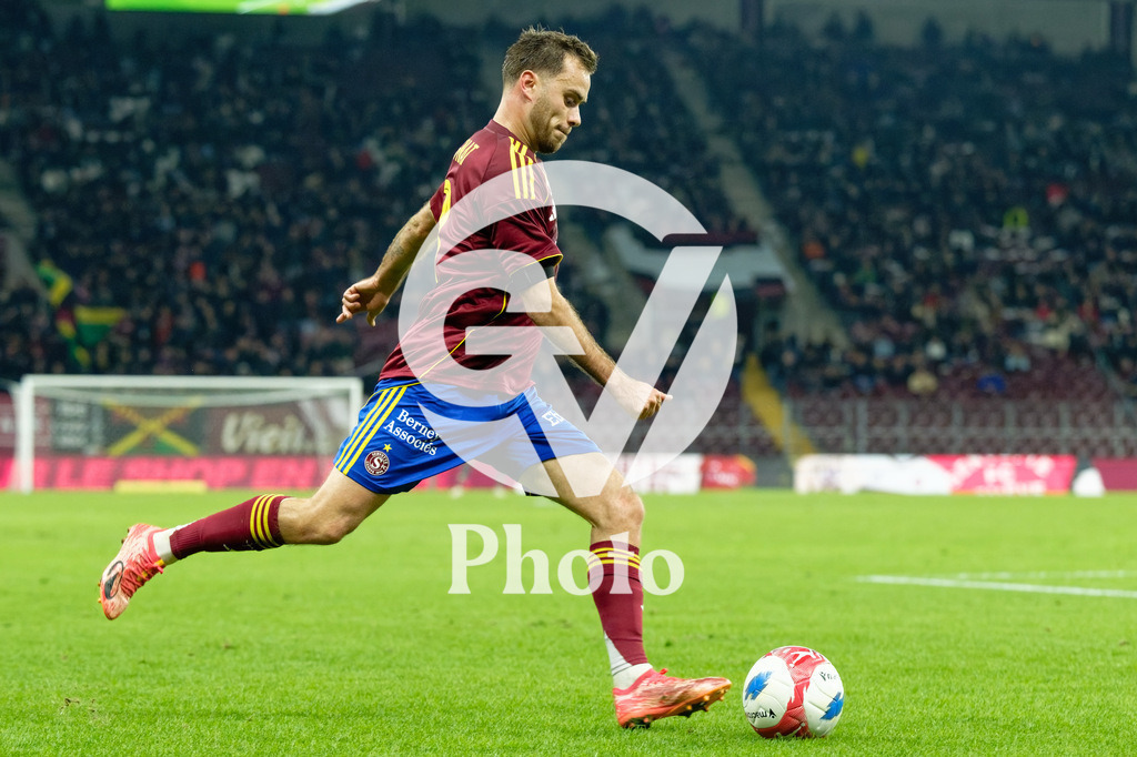 Brack Super League - Servette FC v FC Lausanne-Sport | Timothe Cognat (8 Servette FC) shoots the ball (action)  during the Brack Super League match between Servette FC and FC Lausanne-Sport at Stade de Geneve in Geneva, Switzerland