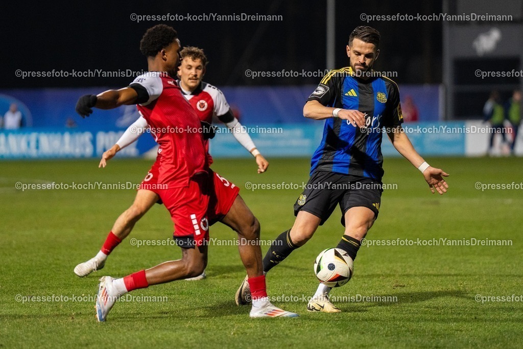 xYDR2802250101037 | 28.02.2025, xydrx, Fußball, Viktoria Köln - 1.FC Saarbrücken, 3.Liga, Sportpark Höhenberg, Saison 2024 2025: Sidny Lopes Cabral (Viktoria Köln #5) im Zweikampf mit Kasim Rabihic (1.FC Saarbrücken #10).  DFB regulations prohibit any use of photographs as image sequences and or quasi-video.