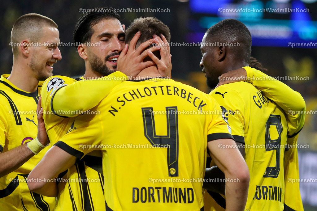 BVB01102402223 | 01.10.2024, Fußball, UEFA Champions League, Borussia Dortmund - Celtic Glasgow, 2. Spieltag, Signal Iduna Park, Saison 2024 2025: Torjubel 6:1 durch Serhou Guirassy (BVB #9). Emre Can (BVB #23) zusammen mit Nico Schlotterbeck (BVB #4)