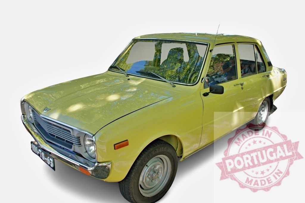 Yellow Mazda 800 parked under a tree projecting shadows on the body | Vintage yellow Mazda 800 is parked under a tree, with shadows projected on the body - Realisiert mit Pictrs.com