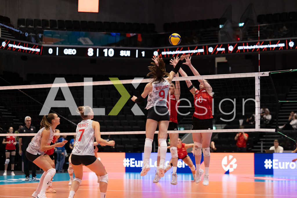 Georgia v Switzerland - CEV European League Women | KRIENS, SWITZERLAND - JUNE 12: SARINA WIELAND of Switzerland attack / spike and MARIAM MUSHKUDIANI of Georgia and MAGDA KOBAIDZE of Georgia double block during the CEV European League match between Georgia and Switzerland at Pilatus Arena on June 12, 2026 in Kriens, Switzerland. - Realisiert mit Pictrs.com