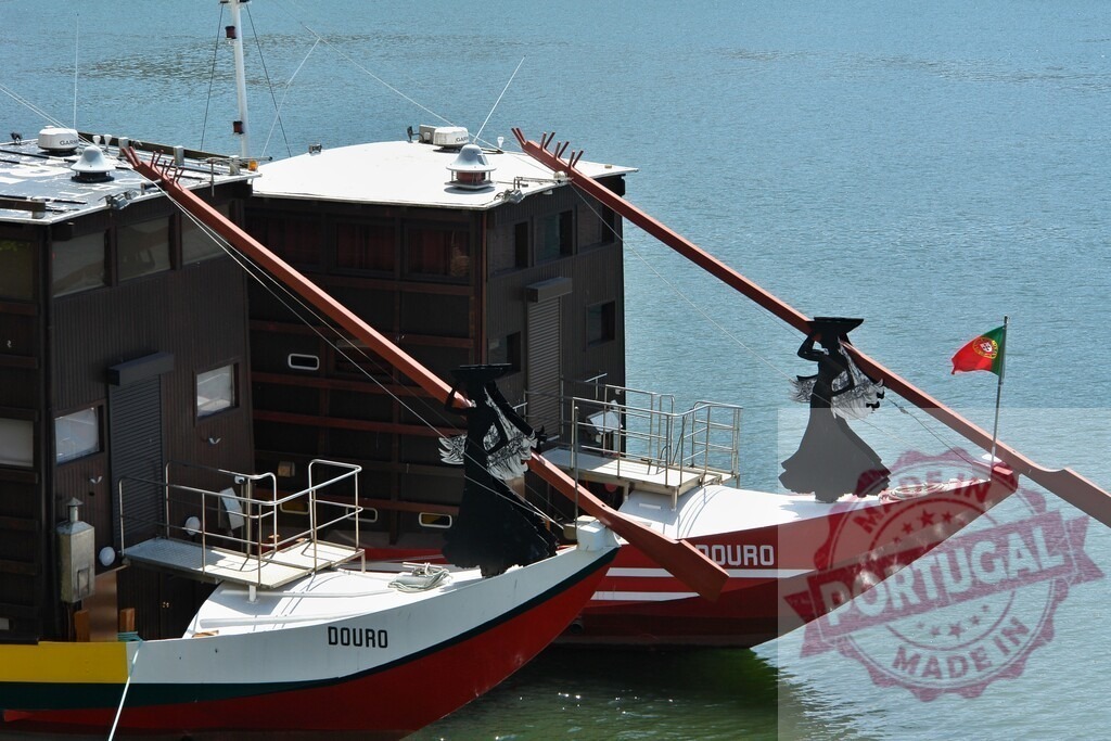 Rabelo boats moored on Douro river, Porto, Portugal. Porto - Portugal | Rabelo boats, traditional Portuguese wine transport vessels, moored on the Douro river - Realisiert mit Pictrs.com