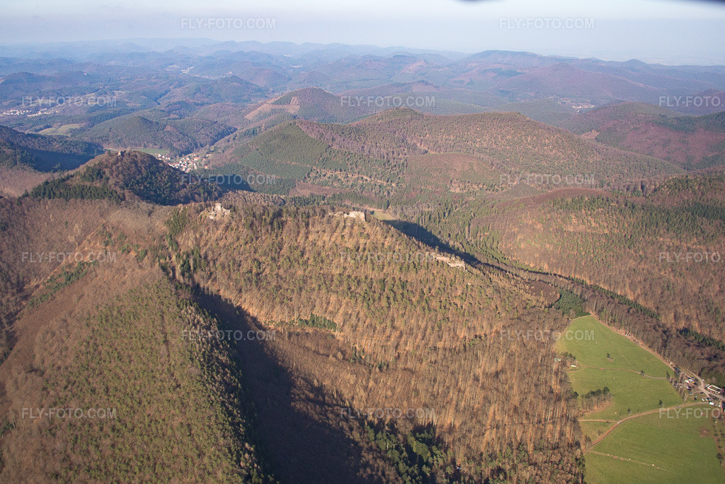 Aerial view: Castle ruins Löwenstein, Hohenburg and Wegelnburg from the south in Wingen in the state Bas-Rhin, France. – Photo: IMG_086711.jpg taken on 03/26/2016 by Werner Riehm/FLY-FOTO.com – Resolution of the original: 5106 x 3404 px