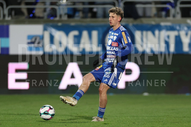 TSV Egger Glas Hartberg vs SV Oberbank Ried – Austrian Bundesliga Match | The image shows Damjan Kovacevic (Hartberg) kick the ball, at the Bundesliga match TSV Hartberg vs SV Ried at Profertil Arena Hartberg. 22.11.2025