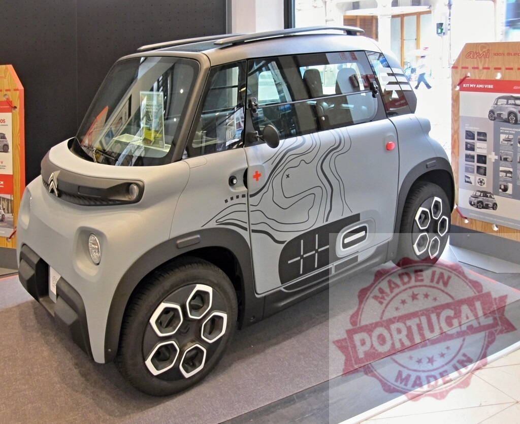 Citroën Ami electric urban microcar with graphic design | Citroën Ami electric city car presenting alternative mobility and sustainability in a showroom - Realized with Pictrs.com