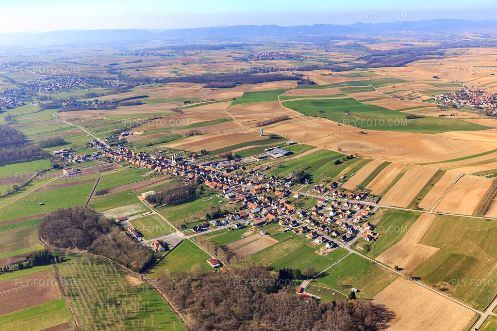 Aerial view: View of the town from the southeast in Aschbach in the state Bas-Rhin, France. – Photo: IMG_097439.jpg taken on 03/16/2017 by Werner Riehm/FLY-FOTO.com – Resolution of the original: 5472 x 3648 px