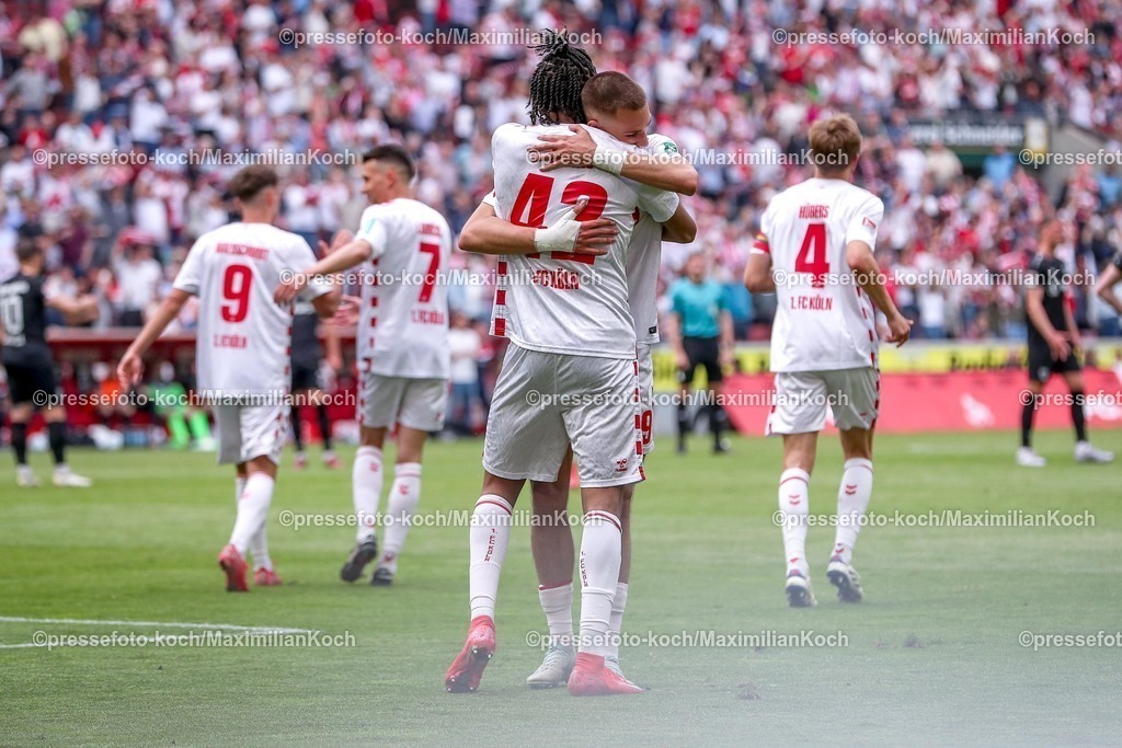 1FC20042501125 | 20.04.2025, Fußball, 1. FC Köln - Preußen Münster, 2.. Fußball Bundesliga, 30. Spieltag, RheinEnergie-STADION, Saison 2024 2025: Torjubel nach dem Tor zum 3:1 durch Torschütze Damion Downs (FC Koeln #42) zusammen mit Tim Lemperle (FC Koeln #19) . DFB regulations prohibit any use of photographs as image sequences and or quasi-video.