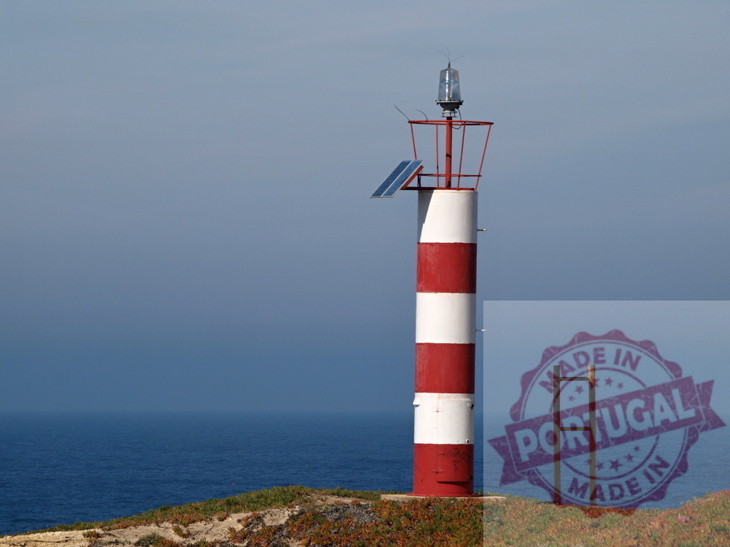 Coastal navigation lighthouse with solar panel powering warning light | Red and white striped lighthouse standing on a cliff by the ocean, guiding marine navigation - Realisiert mit Pictrs.com