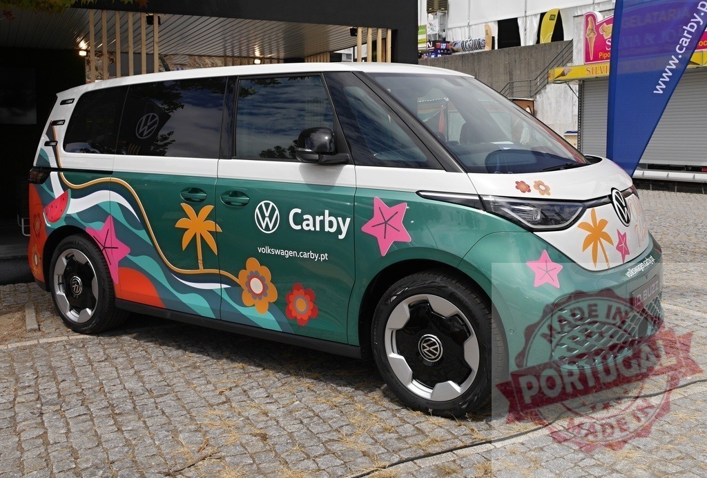 Volkswagen ID. Buzz Carby electric van summer graphics | Volkswagen ID. Buzz electric van featuring colorful summer-themed graphics and Carby branding - Realized with Pictrs.com