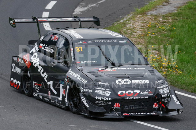 Rechberg Hill Climb 2025 – FIA European Hill Climb Championship | Rechberg Hill Climb 2025, part of the FIA European Hill Climb Championship. High-speed racing action, mountain scenery, atmosphere and pure motorsport passion captured in detail. The image shows Grzegorz Rozalski (POL) Mitsubishi Lancer Evo 9.          