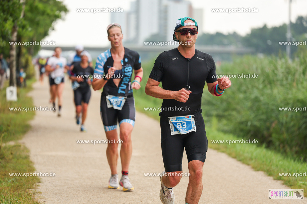 LUR_1911 | 34. M-net Erlanger Triathlon 2025 #erlangertriathlon  #mnettriathlon2025 #mnettriathlon #team #olympischedistanz #mitteldistanz #triathlon #maindonaukanal  #erlangertriathlon2025 #yourpictrs #tv1848 #tv1848erlangen  #triathlonbayern #sportinerlangen #demsportverbunden #sportshot_your_pictrs Copyright: www.sportshot.de