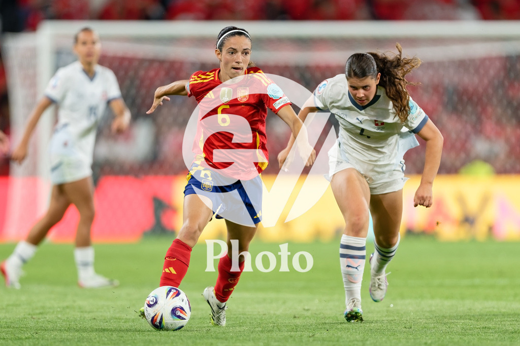Spain v Switzerland - UEFA Women's EURO 2025 Quarter-Final | BERN, SWITZERLAND - JULY 18: Aitana Bonmati of Spain (L)  controls the ball  under pressure from Noemi Ivelj of Switzerland (R) during the UEFA Women's EURO 2025 Quarter-Final match between Spain v Switzerland at Stadion Wankdorf on July 18, 2025 in Bern, Switzerland. (Photo by Giuseppe Velletri/Sports Press Photo/Getty Images)