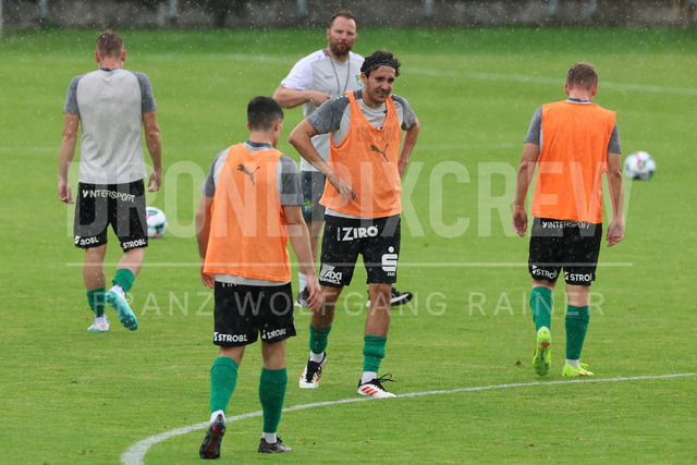 Friendly Match: SC Weiz vs TSV Hartberg in Weiz | Weiz, AUSTRIA, 01.JUL.26 - SOCCER - ADMIRAL Bundesliga, SC Weiz vs TSV Hartberg, test match. The image shows SC Weiz during warm up in heavy rain.