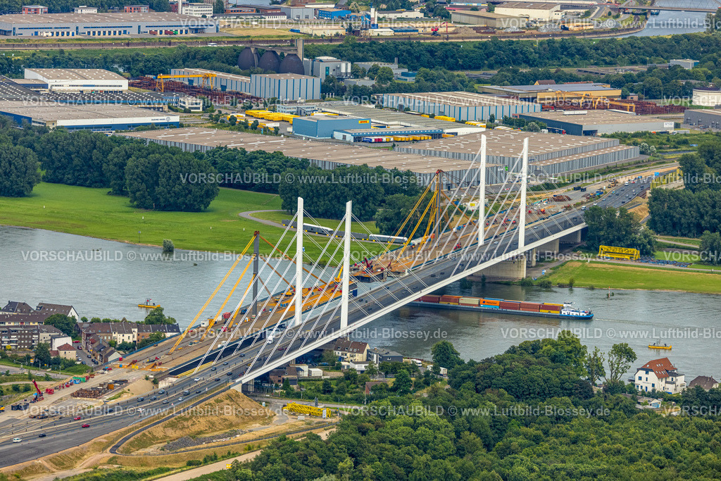 Duisburg240704667-Mitte | Luftbild, Autobahn A40 Rheinbrücke Neuenkamp, Baustelle, Binnenschifffahrt Fluss Rhein, hinten das Gewerbegebiet Am Blumenkampshof, Alt-Homberg, Duisburg, Ruhrgebiet, Nordrhein-Westfalen, Deutschland
