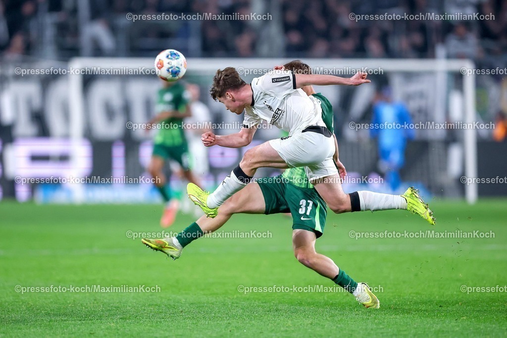 BMG13122502196 | 13.12.2025, Fußball, Borussia Mönchengladbach - VfL Wolfsburg, 1. Fußball Bundesliga, 14.Spieltag, Borussia-Park, Saison 2025 2026: Lukas Ullrich&nbsp;(Borussia Mönchengladbach #26) im Zweikampf gegen Pharell Hensel (VfL Wolfsburg #37) DFB regulations prohibit any use of photographs as image sequences and or quasi-video.