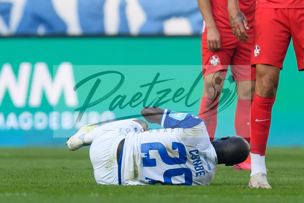 FCMFCK20210904_014 | Fussball, Herren: Amara Conde (1. FC Magdeburg) enttaeuscht beim Spiel der 3. Liga zwischen 1. FC Magdeburg und 1. FC Kaiserslautern in der MDCC-Arena am 04.09.2021 in Magdeburg, Deutschland.DFB / DFL REGULATIONS PROHIBIT ANY USE OF PHOTOGRAPHS AS IMAGE SEQUENCES AND/OR QUASI-VIDEO. - Realisiert mit Pictrs.com