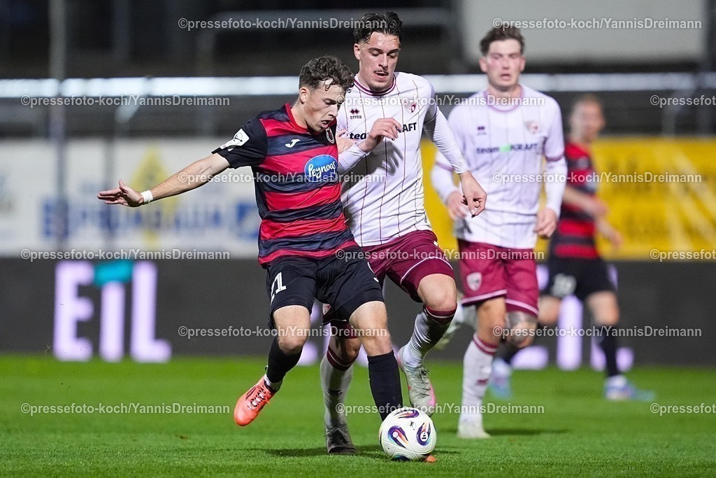 xYDR31102501022 | 31.10.2025, xydrx, Fußball, 3.Liga, FC Viktoria Köln - FC Ingolstadt 04, Saison 2025 2026, Sportpark Höhenberg: Lucas Wolf (FC Viktoria Köln #21) im Zweikampf gegen Dennis Kaygin (FC Ingolstadt #10)  DFB regulations prohibit any use of photographs as image sequences and or quasi-video.