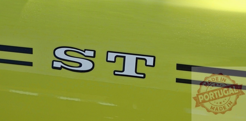 Yellow car branding with ST letters | Yellow car surface displaying ST letters and black racing stripe detail - Realized with Pictrs.com