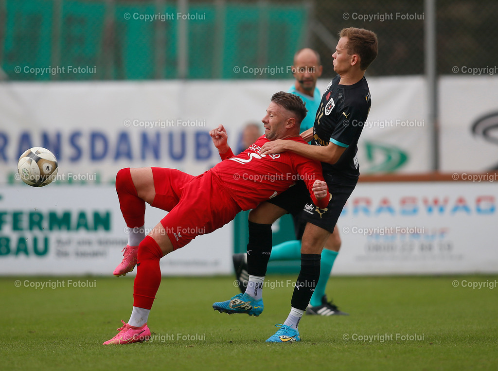 A_LUI_230923_07 | SPORT,FUSSBALL,LT1 OOELIGA ASKOE OEDT-SV ZEBAU BAD ISCHL 29.09.2023 IM BID: MANUEL SCHMIDL  (OEDT) UND FLORIAN BICHLER(BAD ISCHL)FOTO:FOTOLUI
