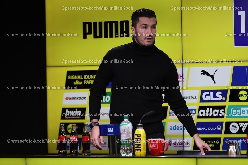 BVB10012501149 | 10.01.2025, Fußball, Borussia Dortmund - Bayer 04 Leverkusen, 1. Fußball Bundesliga, 16. Spieltag, Signal Iduna Park, Saison 2024 2025: Pressekonferenz mit den Trainern nach dem Spiel - Trainer Nuri Sahin (Cheftrainer BVB) betritt die PKDFB regulations prohibit any use of photographs as image sequences and or quasi-video.