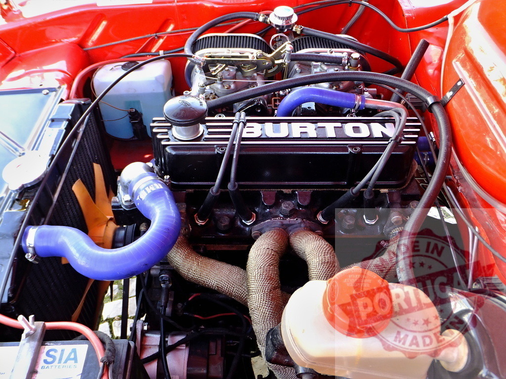Powerful Burton Engine Showing Custom Performance Parts | Customized engine featuring a Burton valve cover and performance enhancements, ideal for automotive enthusiasts - Realized with Pictrs.com