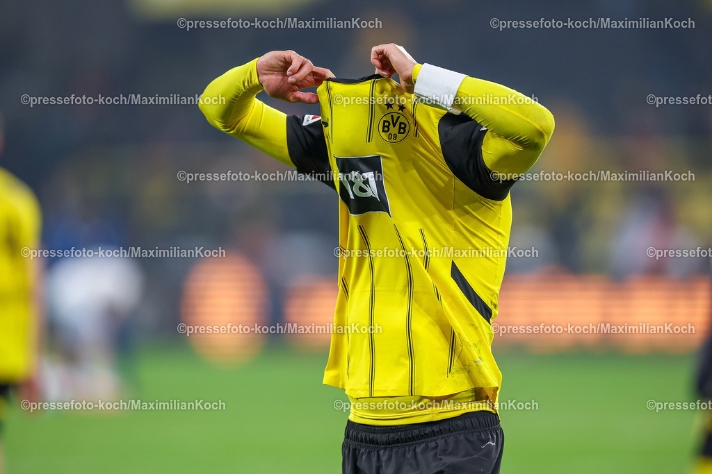 BVB15122401107 | 15.12.2024, Fußball, Borussia Dortmund - TSG 1899 Hoffenheim, 1. Fußball Bundesliga, 14. Spieltag, Signal Iduna Park, Saison 2024 2025: Enttäuschung - Enttäuschte Gesichter nach dem 1:1 Ausgleich Endstand beim BVB - Emre Can (BVB #23) zieht sich das Trickot über den KopfDFB regulations prohibit any use of photographs as image sequences and or quasi-video.