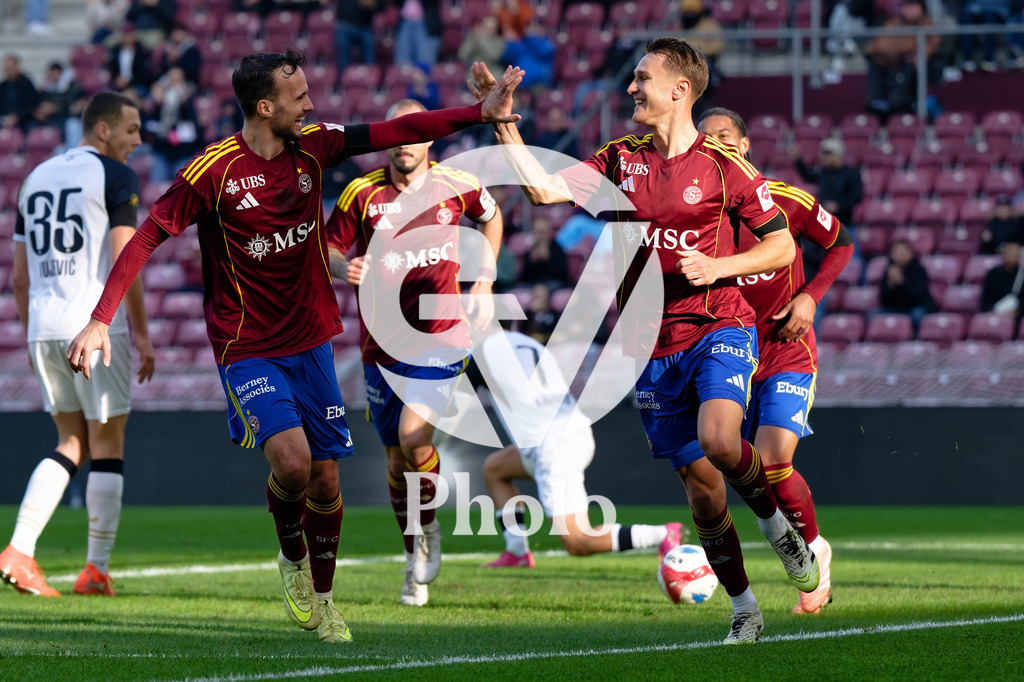 Brack Super League - Servette FC v FC Zurich | Marco Burch (15 Servette FC) celebrates after scoring his team's first goal with Jeremy Guillemenot (21 Servette FC)   during the Brack Super League match between Servette FC and FC Zurich at Stade de Geneve in Geneva, Switzerland