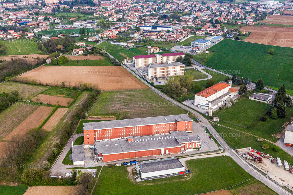 Aerial view: Warehouses for the maturation of ham in the industrial area of Prosciuttificio Friulano and Leoncini Prosciutti in San Daniele del Friuli in the state Udine, Italy.Photo: IMG_098754.jpg taken on 04/07/2017 by Werner Riehm/FLY-FOTO.comResolution of the original: 5430 x 3620 px