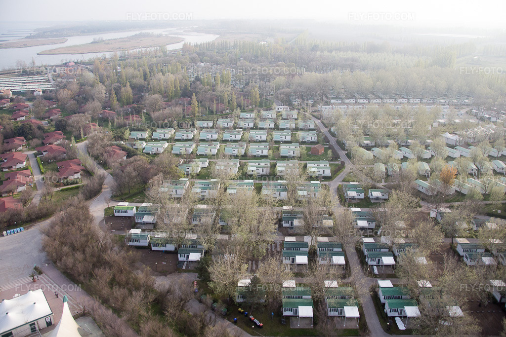 Aerial view: Isola Vercde, Camping Isamar in the district Isola Verde in Chioggia in the state Veneto, Italy. – Photo: IMG_087592.jpg taken on 04/06/2016 by Werner Riehm/FLY-FOTO.com – Resolution of the original: 5472 x 3648 px