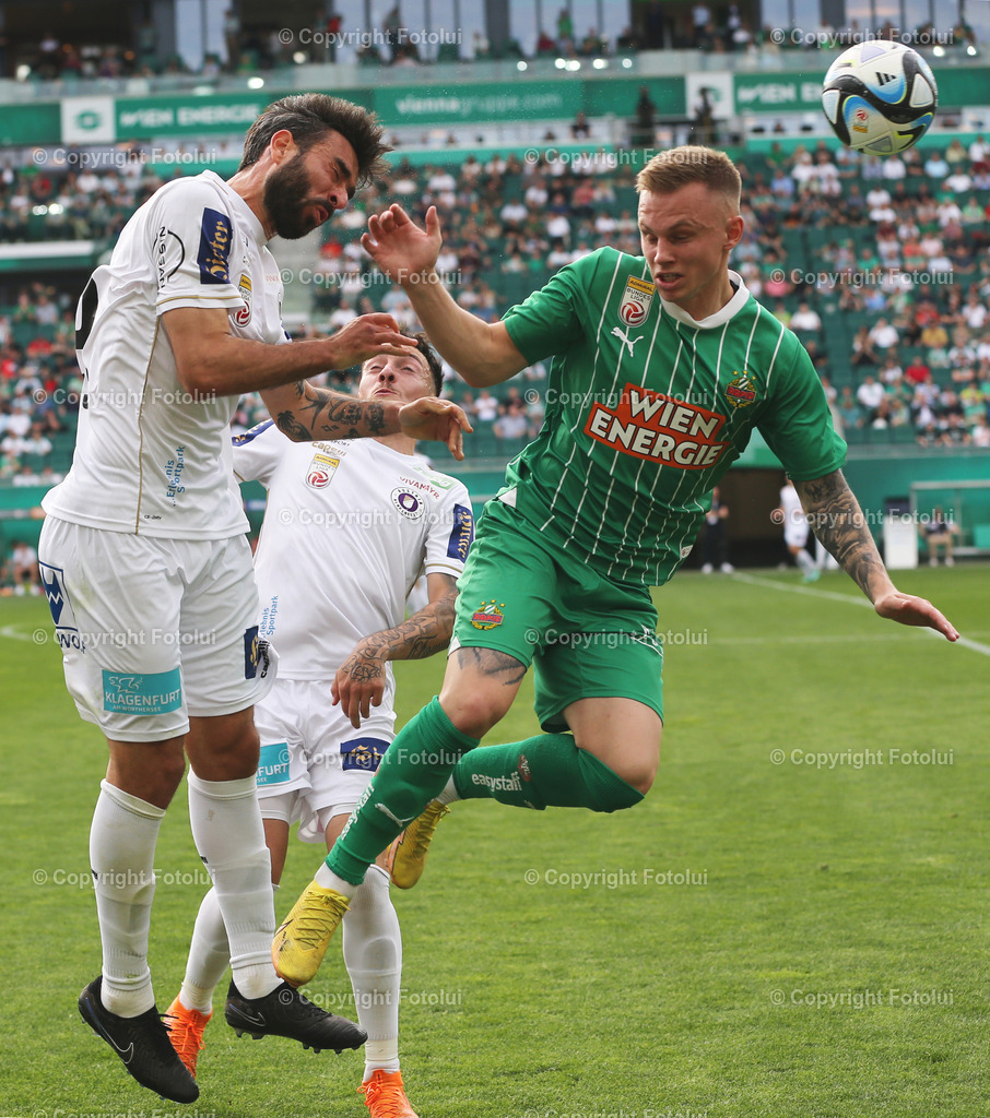 A_LUI_14042024_19 | SPORT,FUSSBALL.ADMIRAL BUNDESLIGA SK RAPID-AUSTRIA KLAGENFURT14.04.2024 IM BILD: ISAK JANSSON (RAPID) UND KOSMAS GKEZOS (KLAGENFURT) FOTO.FOTOLUI/MW