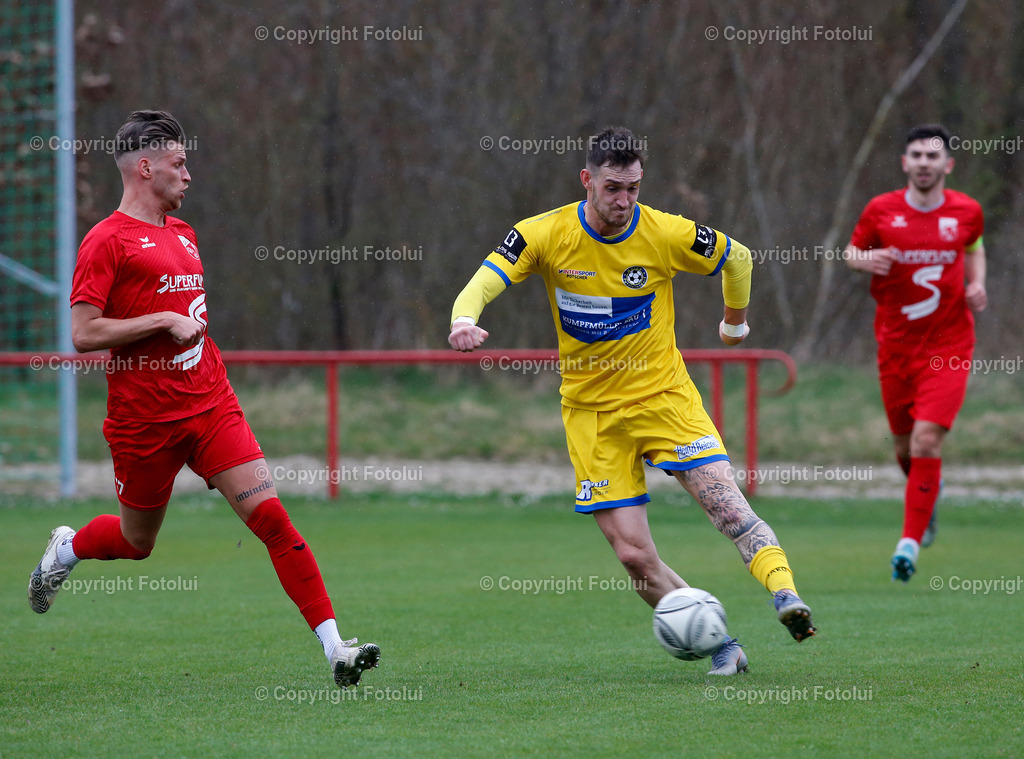 A_LUI_26032023_29 | SPORT,FUSSBALL LL.OST ASKOE OEDT 1B-PUTZLEINSDORF 26.03.2023 IM BILD: MICHAEL LEOHARTSBERGER (OEDT1B) UND MATYAS MARKYTAN   (PUTZLEINSDORF) FOTO:FOTOLUI