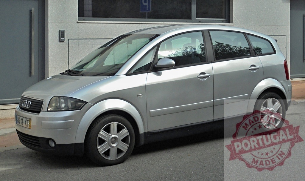 Audi A2 silver hatchback car parked outdoors | Audi A2 silver car parked on an asphalt street in an urban environment - Realisiert mit Pictrs.com