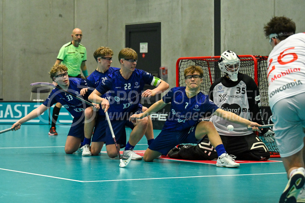 Switzerland U19 vs Finland U19 - 3. February 2024 | Switzerland U19 vs Finland U19
U19 Men International Matches in Switzerland
GoEasy Arena, Siggenthal Station
Switzerland forward #26 Janis Reusser testing the Finnish wall with forward #33 Marius Niemelä, forward #22 Ville Heiska, forward #7 Markus Maronen and goalkeeper #35 Jonni Ohvo.
Credit: Markus Aeschimann | <a href="https://www.markus-aeschimann.ch">Sportfotografie Markus Aeschimann</a> | <a href="https://www.instagram.com/sportfotografie.aeschimann">@sportfotografie.aeschimann</a> - Realisiert mit Pictrs.com